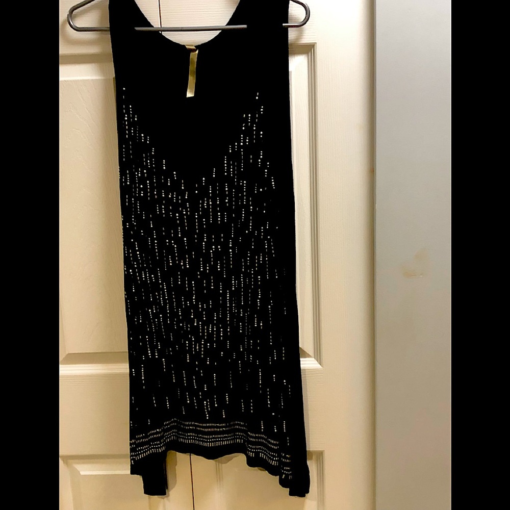 3x black tank with silver